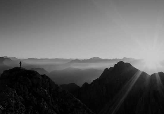 Person on Mountain Peak